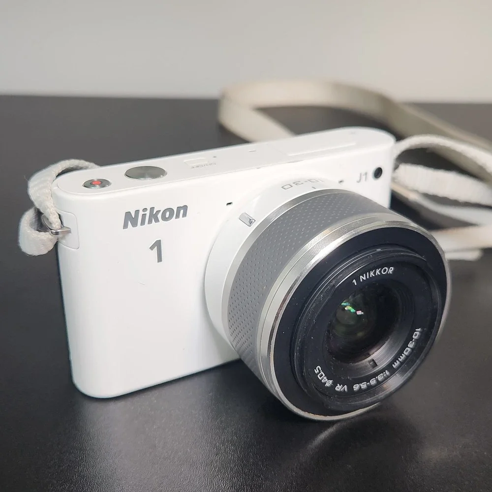 Nikon 1 J1 Digital Camera White w/ 10-30 & 30-110 Lens Hood 3 Batteries SD Card